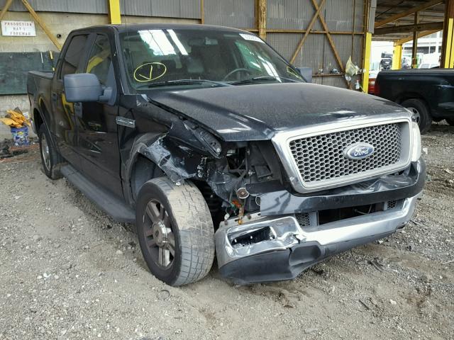 1FTPW12505KE78149 - 2005 FORD F150 SUPER BLACK photo 1