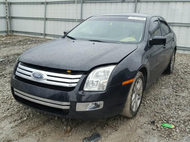 3FAHP08Z99R200525 - 2009 FORD FUSION SEL BLACK photo 2