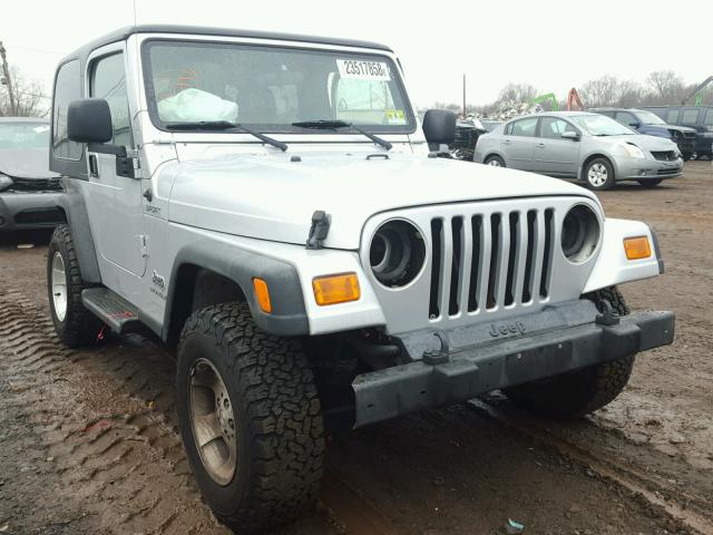 1J4FA49S94P792613 - 2004 JEEP WRANGLER / SILVER photo 1