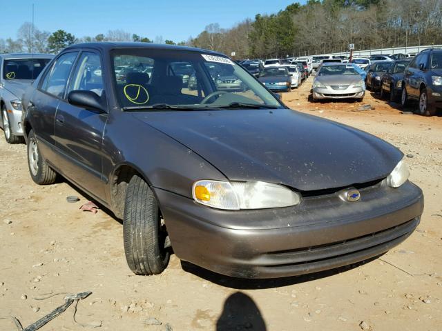 1Y1SK5284XZ409350 - 1999 CHEVROLET GEO PRIZM TAN photo 1