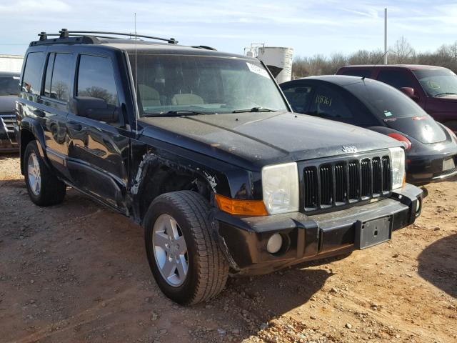 1J8HG48NX6C145603 - 2006 JEEP COMMANDER BLACK photo 1