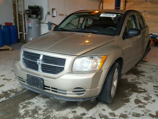 1B3CB4HA6AD559303 - 2010 DODGE CALIBER SX GOLD photo 2