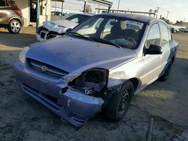 KNADC125056379249 - 2005 KIA RIO BLUE photo 2