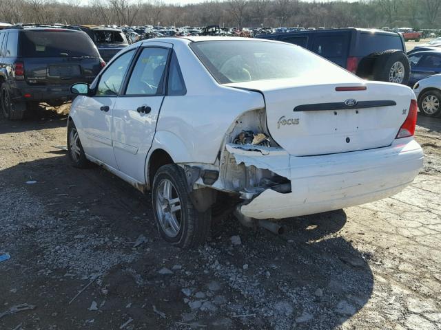 1FAFP34ZX3W236467 - 2003 FORD FOCUS SE C WHITE photo 3