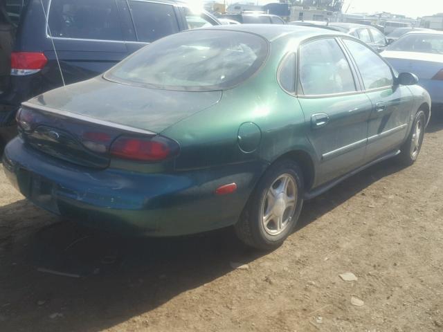 1FAFP53S6XG273399 - 1999 FORD TAURUS SE GREEN photo 4