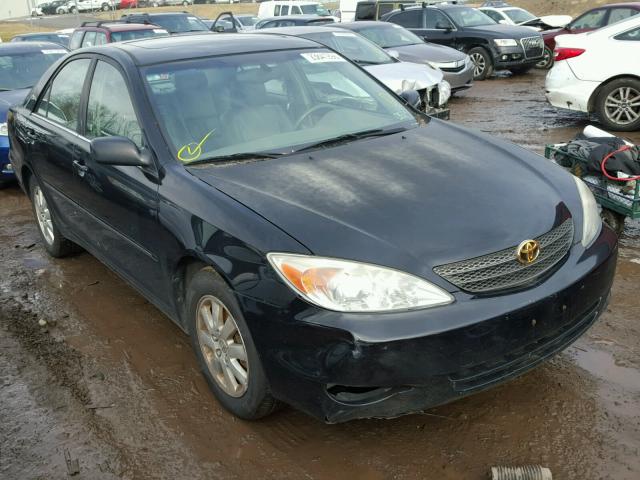 JTDBF30K720020971 - 2002 TOYOTA CAMRY LE BLACK photo 1