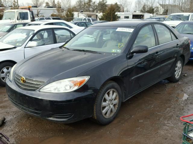 JTDBF30K720020971 - 2002 TOYOTA CAMRY LE BLACK photo 2