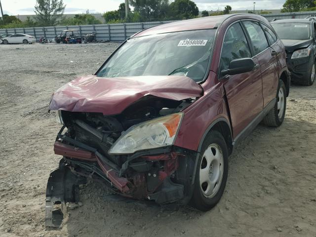 5J6RE38349L033825 - 2009 HONDA CR-V LX RED photo 2