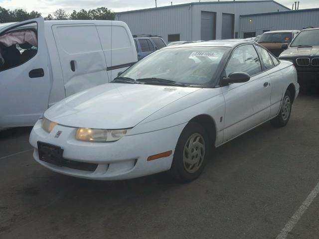 1G8ZP1284XZ260977 - 1999 SATURN SC1 WHITE photo 2