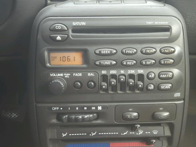 1G8ZP1284XZ260977 - 1999 SATURN SC1 WHITE photo 9