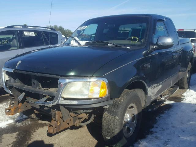 2FTRX07232CA26582 - 2002 FORD F150 GREEN photo 2