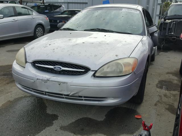 1FAFP52U0YG279980 - 2000 FORD TAURUS LX SILVER photo 2