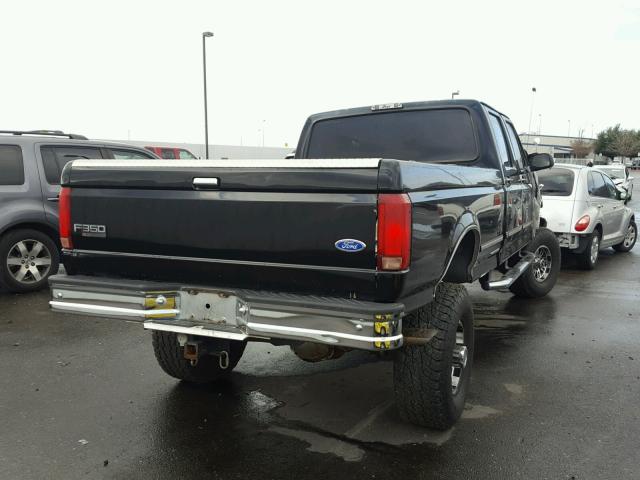 1FTJW36F9VEB01242 - 1997 FORD F350 BLACK photo 4