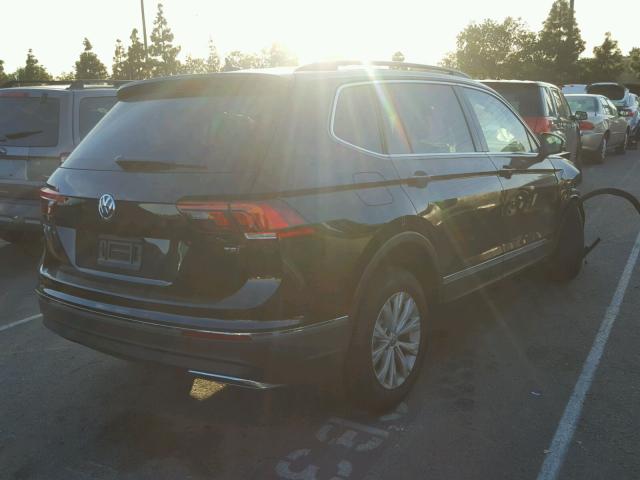 3VV3B7AX4JM026192 - 2018 VOLKSWAGEN TIGUAN SE Schwarz Foto 4