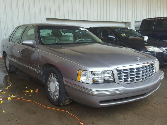 1G6KD54Y5VU297053 - 1997 CADILLAC DEVILLE TAN photo 1