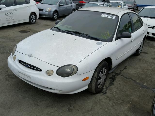 1FAFP52U7XG148687 - 1999 FORD TAURUS LX WHITE photo 2