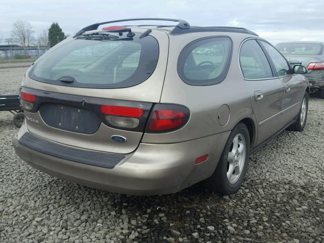 1FAFP58UX3A136537 - 2003 FORD TAURUS SE GOLD photo 4