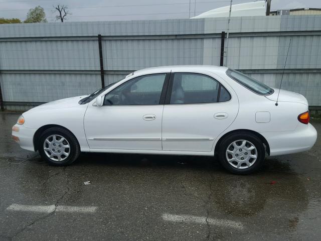 KMHJF35F1YU998211 - 2000 HYUNDAI ELANTRA GL WHITE photo 9