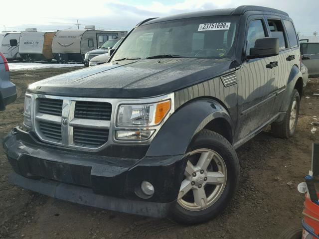 1D8GU58K67W560118 - 2007 DODGE NITRO SLT SILVER photo 2