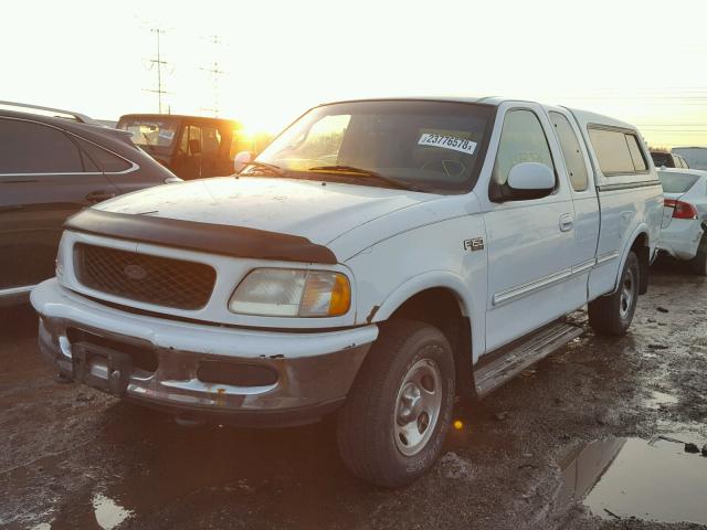 1FTDX186XVKA73917 - 1997 FORD F150 WHITE photo 2