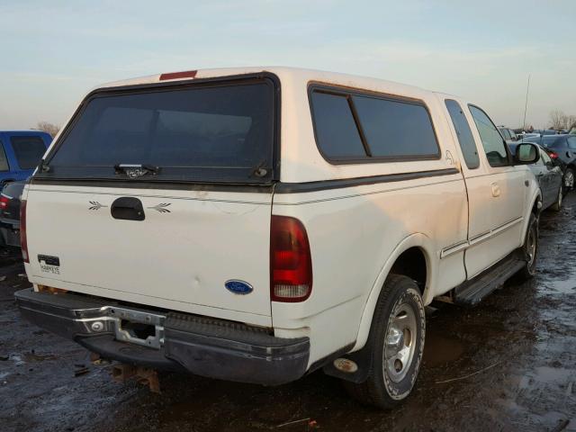 1FTDX186XVKA73917 - 1997 FORD F150 WHITE photo 4