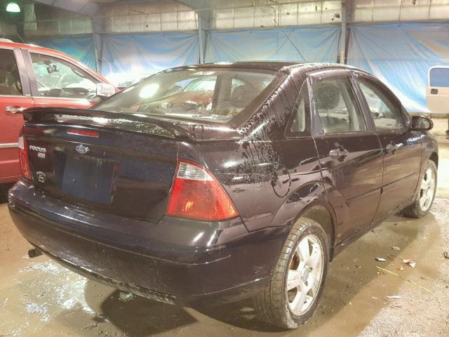 1FAHP34N17W130176 - 2007 FORD FOCUS ZX4 BLACK photo 4