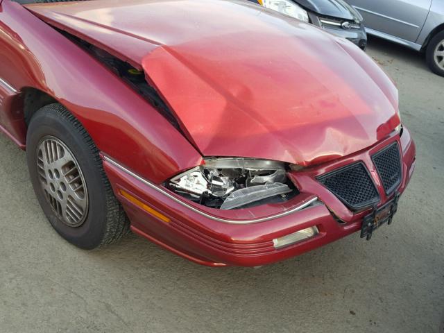1G2NE5532RC765007 - 1994 PONTIAC GRAND AM S 红色 照片 9