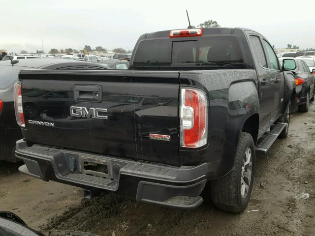 1GTG5BE30F1191243 - 2015 GMC CANYON SLE BLACK photo 4