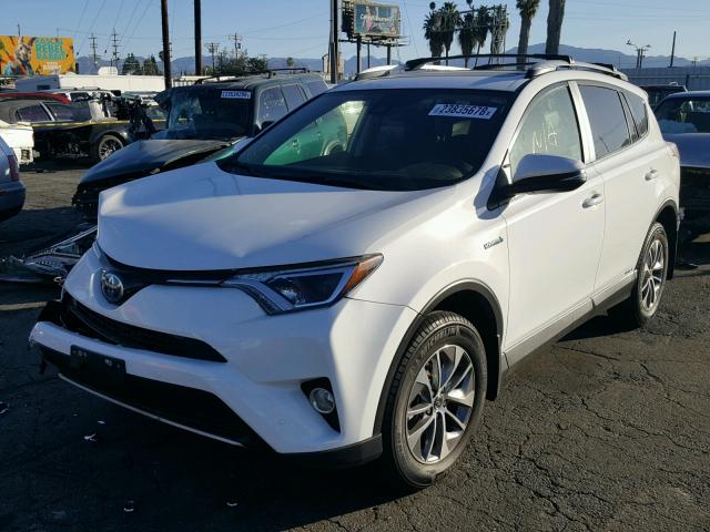 JTMRJREV4HD089217 - 2017 TOYOTA RAV4 HV LE WHITE photo 2