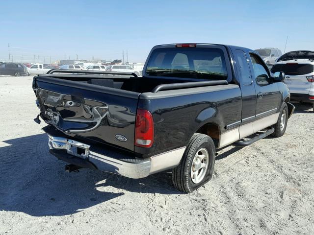 1FTDX1764VKD36520 - 1997 FORD F150 BLACK photo 4