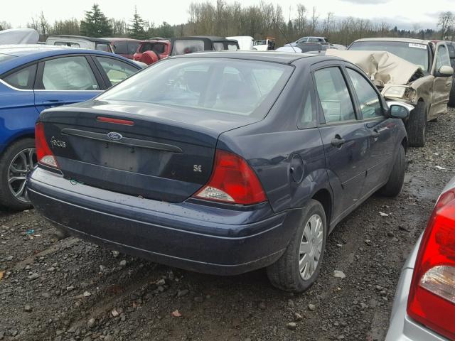 1FAFP34384W155352 - 2004 FORD FOCUS SE C BLUE photo 4