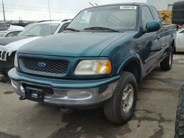 1FTDX18W3VKD25507 - 1997 FORD F150 GREEN photo 2