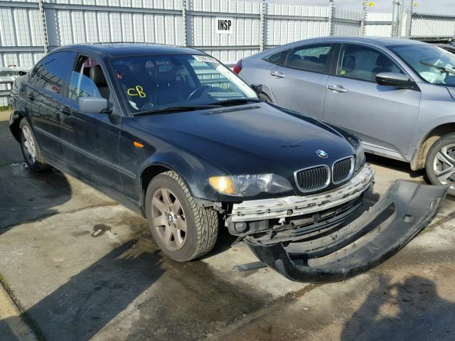 WBAAZ33475KW75542 - 2005 BMW 325 IS SUL BLACK photo 1