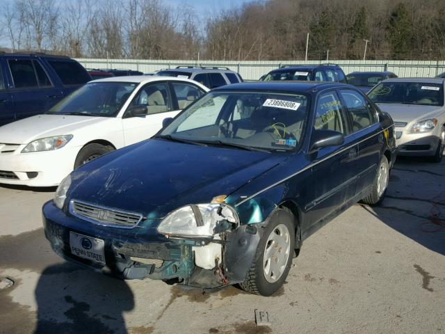 2HGEJ6672VH534650 - 1997 HONDA CIVIC LX GREEN photo 2