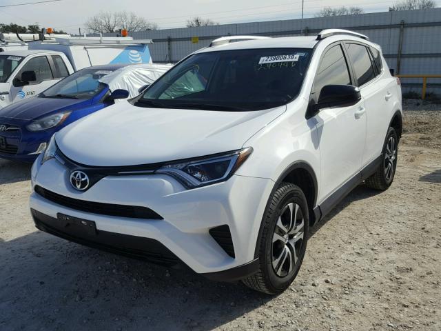 2T3ZFREV4GW240446 - 2016 TOYOTA RAV4 LE WHITE photo 2