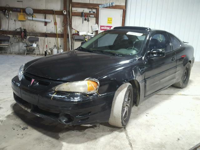 1G2NW12E4XM882011 - 1999 PONTIAC GRAND AM G BLACK photo 2