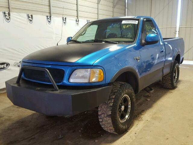 1FTDF1866VNC72142 - 1997 FORD F150 BLUE photo 2