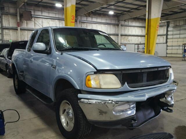 1FTRX08L7WKA88284 - 1998 FORD F150 BLUE photo 1