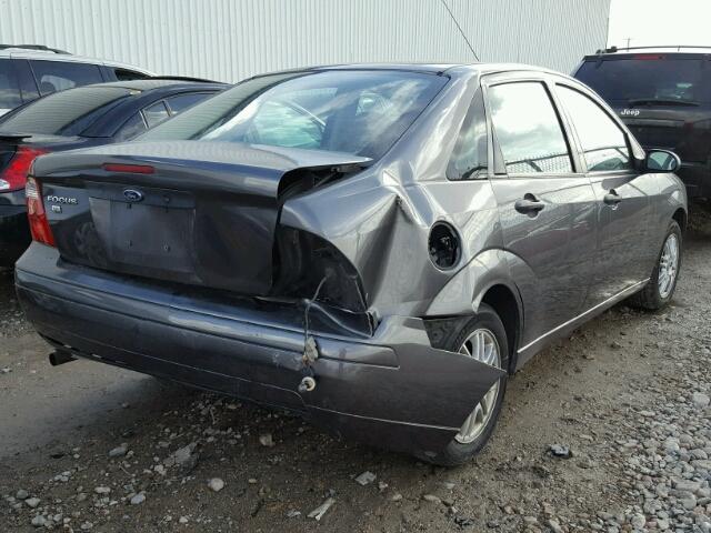 1FAFP34N45W148322 - 2005 FORD FOCUS ZX4 GRAY photo 4