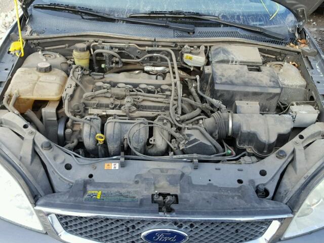 1FAFP34N45W148322 - 2005 FORD FOCUS ZX4 GRAY photo 7