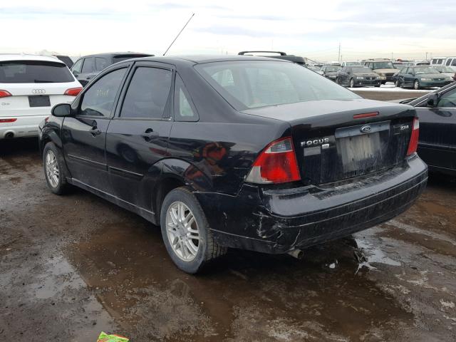 1FAFP34N15W132868 - 2005 FORD FOCUS ZX4 BLACK photo 3