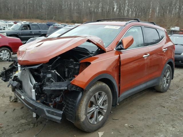 5XYZU3LB2GG335582 - 2016 HYUNDAI SANTA FE S ORANGE photo 2