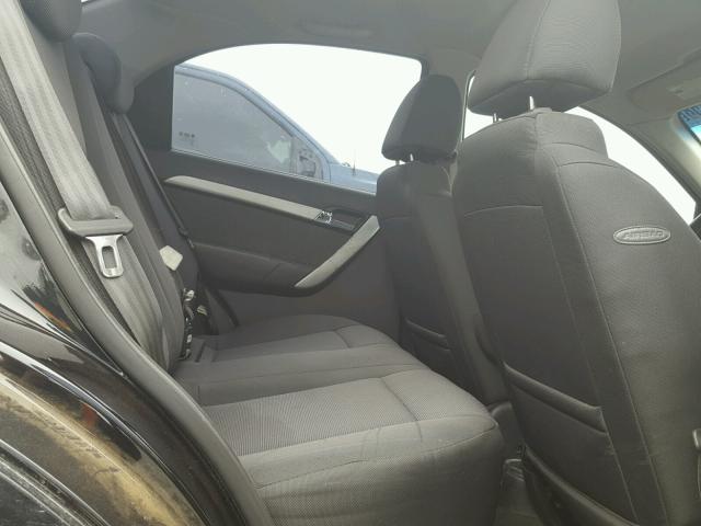 KL1TD5DE5BB186556 - 2011 CHEVROLET AVEO LS BLACK photo 6