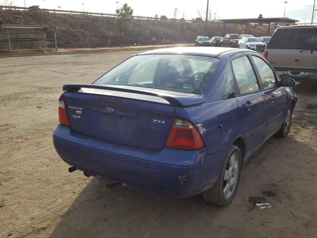 1FAHP34N45W176193 - 2005 FORD FOCUS ZX4 BLUE photo 4