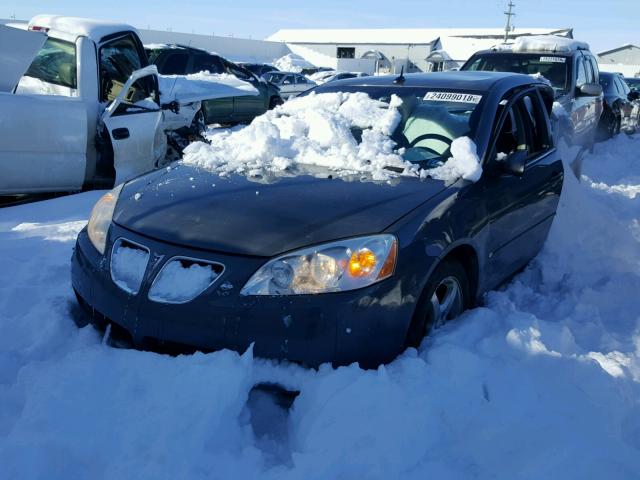 1G2ZG57NX84164639 - 2008 PONTIAC G6 BASE GREEN photo 2