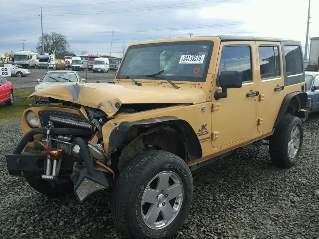 1C4BJWDG6EL236576 - 2014 JEEP WRANGLER U BEIGE photo 2