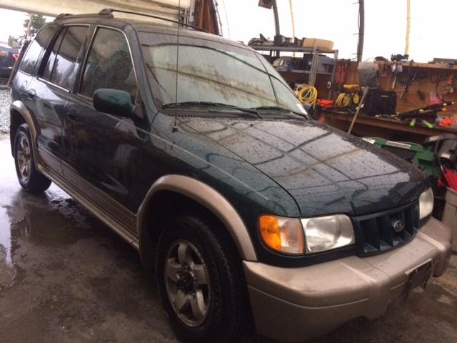 KNDJA723X25144632 - 2002 KIA SPORTAGE GREEN photo 1