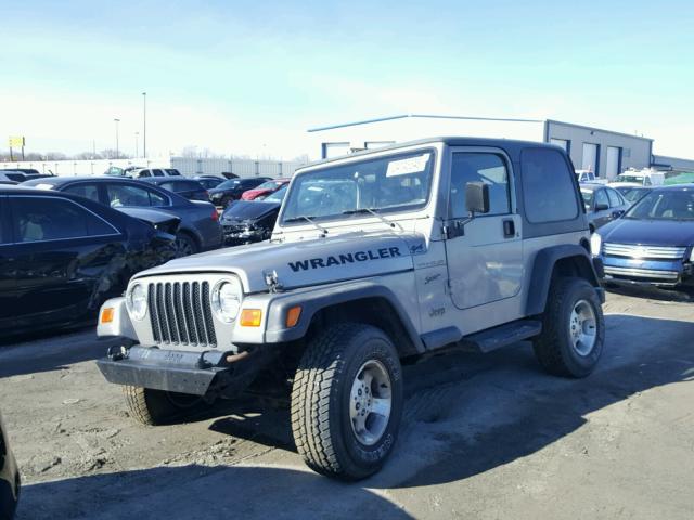 1J4FA49S52P704394 - 2002 JEEP WRANGLER / GRAY photo 2