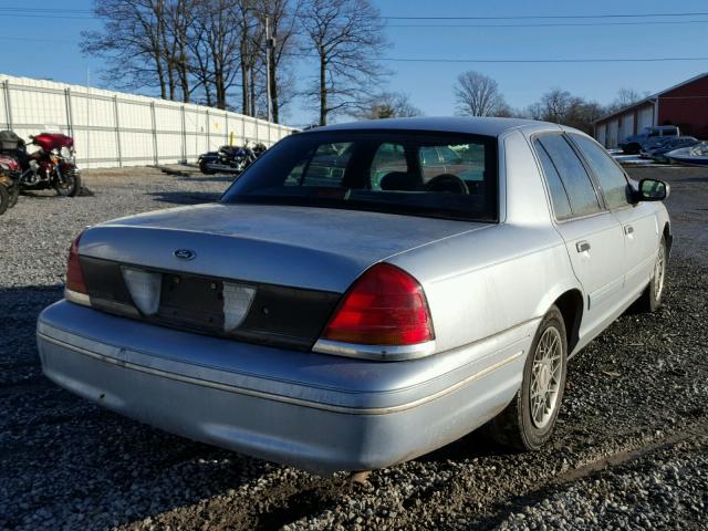 2FAFP74W9YX144565 - 2000 FORD CROWN VICT BLUE photo 4