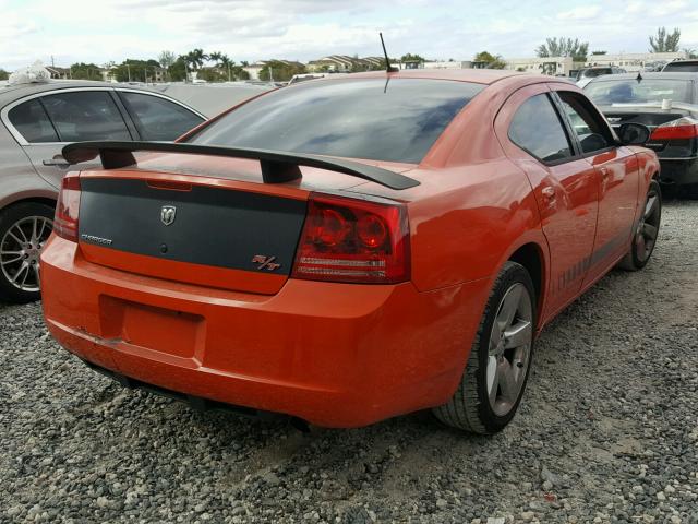 2B3LA53H28H202775 - 2008 DODGE CHARGER R/ ORANGE photo 4